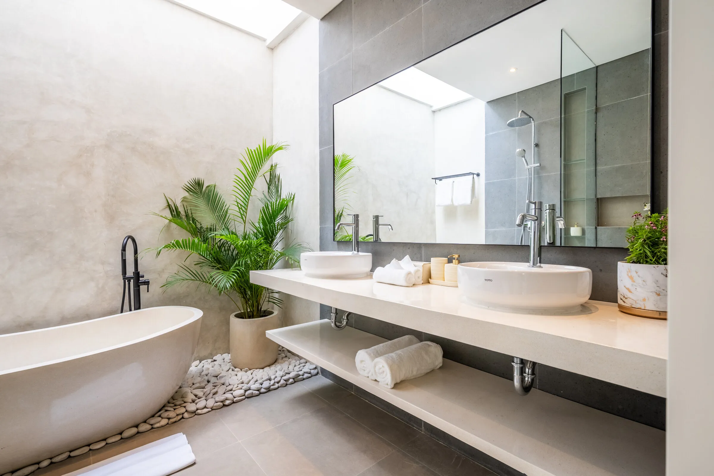 Master bathroom with freestanding bathtub and double vanity