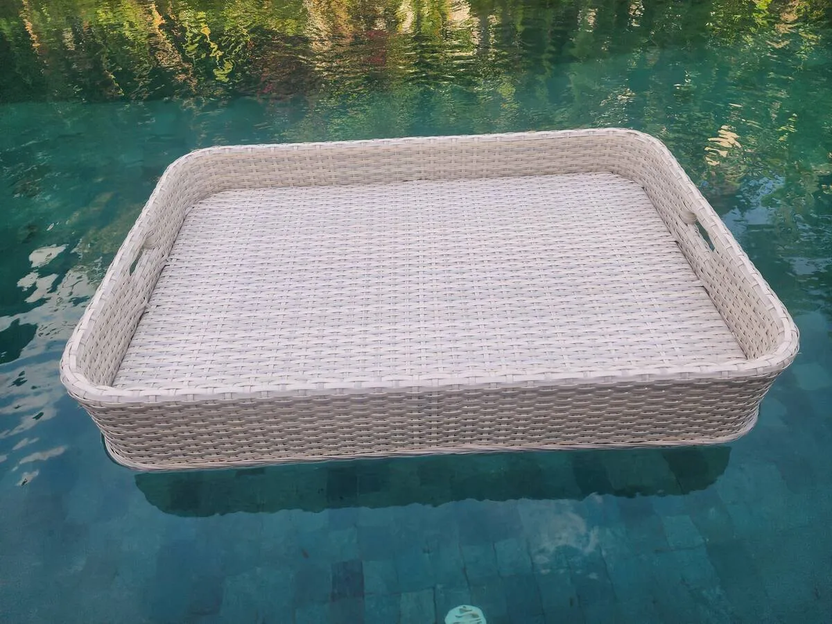 Woven floating breakfast tray on the villa pool
